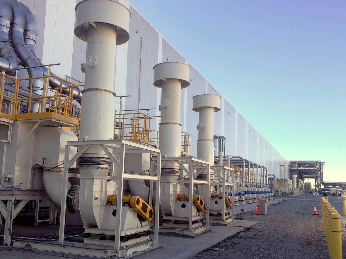 Row of exhaust fans and stacks at a battery plant in Ohio